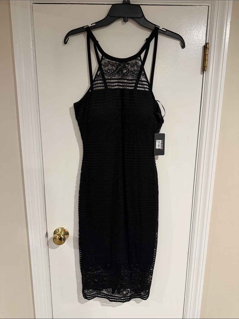 NWT Guess Dress Size 6. Black with detailed lace overlay. Zipper back, halter.